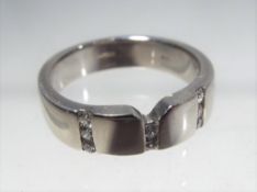 A platinum Darius ring stone set with diamonds Birmingham hallmark stamped 950, size M,
