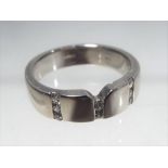 A platinum Darius ring stone set with diamonds Birmingham hallmark stamped 950, size M,