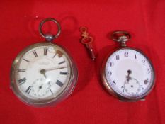 An Edward VII silver cased pocket watch Birmingham assay 1906 by J G Graves and a further watch