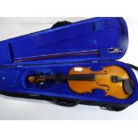 A child's practice violin entitled The Senator Student bearing internal paper label,