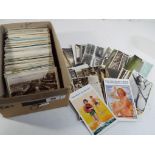 A good collection in excess of 600 mainly early UK and Foreign topographical postcards including