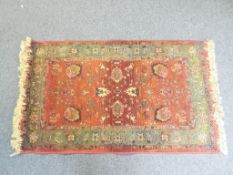 A good good quality carpet / rug measuring approx 80cm x 140cm