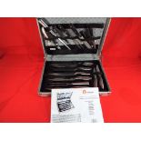 An eleven piece Dimple Knife and Accessory briefcase set by Ultimate Products Ltd Est £20 - £30