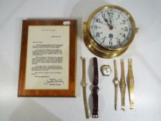 A lot to include a Sewills of Liverpool porthole clock, six wristwatches to include Sekonda,
