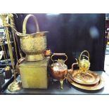 A collection of brass ware and copper ware to include fireside companion, coal scuttle,