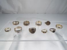 Six silver rings predominantly stamped 925 and a further three white metal rings