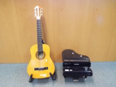 A Palma PL12 child's acoustic guitar with stand and a Hohner child's toy electric piano (3)