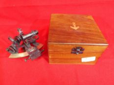 A wooden case containing a sextant marked Kelvin and Hughes of London Est £30 - £50