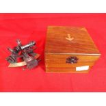 A wooden case containing a sextant marked Kelvin and Hughes of London Est £30 - £50