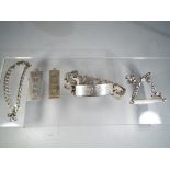 A quantity of silver jewellery to include bracelets and pendants,