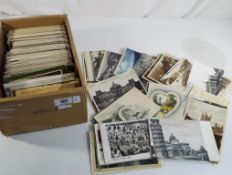 A good collection of over 700 early UK and Foreign topographical postcards including street scenes