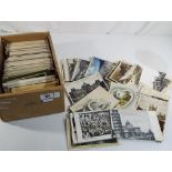 A good collection of over 700 early UK and Foreign topographical postcards including street scenes