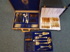 A set of Royal Collection Solingen gold plated flatware also included is a separate case containing