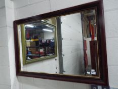 A good quality wood framed bevel edged wall mirror approx 67cm x 98cm - This lot MUST be paid for