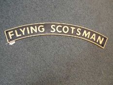A cast iron sign entitled The Flying Sco