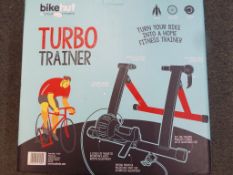 A turbo trainer by Bikehut, boxed