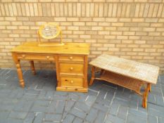 A solid pine dressing table with mirror,