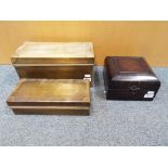 A good quality small wooden storage box approx 12cm x 18cm x 18cm and two graduated metal storage
