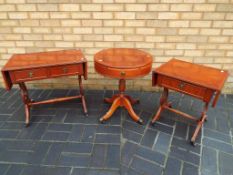 Two occasional drop-leaf tables with drawers, also included in the lot is a drum table.