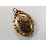 A 9 carat gold, stone set locket, approx 6.