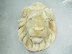 Garden Stoneware - a stone mask in the form of a lion.