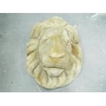 Garden Stoneware - a stone mask in the form of a lion.