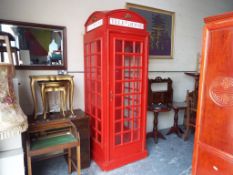 A wooden full size traditional British telephone box / kiosk,