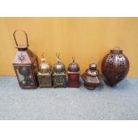 Six decorative hanging lanterns varying sizes with pierced decoration