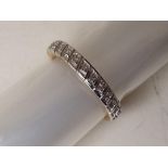 A lady's 9 carat gold 15 point diamond set full eternity ring, approx 2.