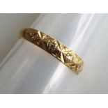 A hallmarked 18 carat yellow gold ring set with six 8-cut diamonds, size L, approx weight 2.