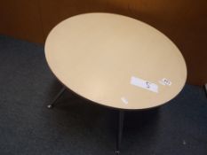 A good quality circular contemporary occasional table on chrome supports,