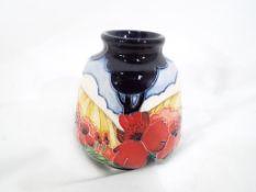 Moorcroft Pottery - a Moorcroft Pottery Forever England vase approx 8.