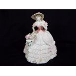 Coalport - a Coalport figurine from the Celebration of the Seasons Collection entitled Rose Blossom