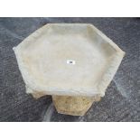 Garden Stoneware - a stone Gothic style birdbath with hexagonal top.