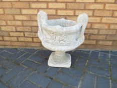 Garden Stoneware - a large decorative stone two-handled urn.