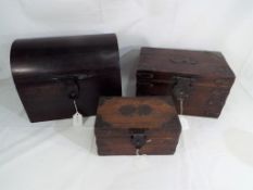 Three small wooden storage boxes one in the form of a tea caddy (3) Est £30 - £50