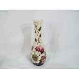 Moorcroft Pottery - a Moorcroft Pottery vase in the Bramble Revisited pattern Approx 21cm (h) Est