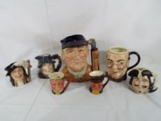 Seven character jugs to include Royal Doulton D6623 Golfer approx 19cms (h),