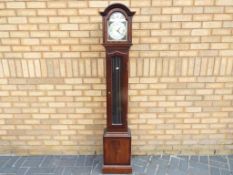 A Grandmother Clock marked to the dial Tempus Fugit,