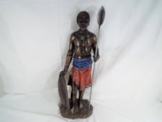 A very large Leonardo Collection figurine depicting a Masai Warrior approx 65.