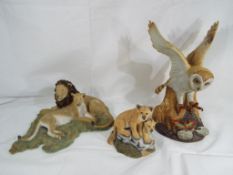 Two figural groups by Sherratt and Simpson depicting lions and an Alfro of London ceramic figure of