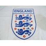 A cast iron England Football wall plaque, 31 cm x 22.5 cm .