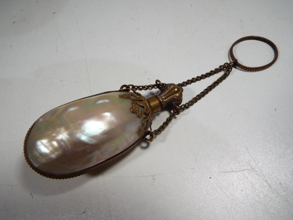 A mid 19th century French Mother of Pearl Chatelaine stoppered perfume bottle with yellow metal - Image 6 of 6