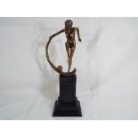 An Art Deco style figurine depicting a female nude approx 34cm (h)