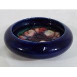 Moorcroft Pottery - a small Moorcroft Pottery bowl decorated with Anemone on a blue ground