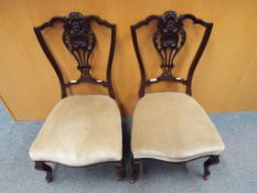 A pair of Queen Anne nursing chairs with upholstered seats