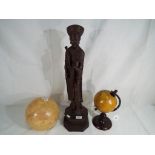 A large Chinese figurine depicting a courtier approx 55cm (h) and two terrestrial globes (3)