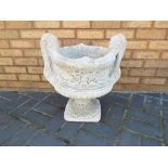 Garden Stoneware - a large decorative stone two-handled urn.