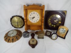 Eight clocks comprising wall clocks, mantel clocks, alarm clock, carriage clock to include Metamec,