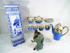 Asian ceramics - a blue and white vase on stand,